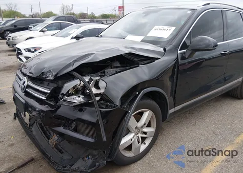 2012 Volkswagen Touareg Tdi Lux z USA, uszkodzony, nr VIN WVGFK9BP7CD004140